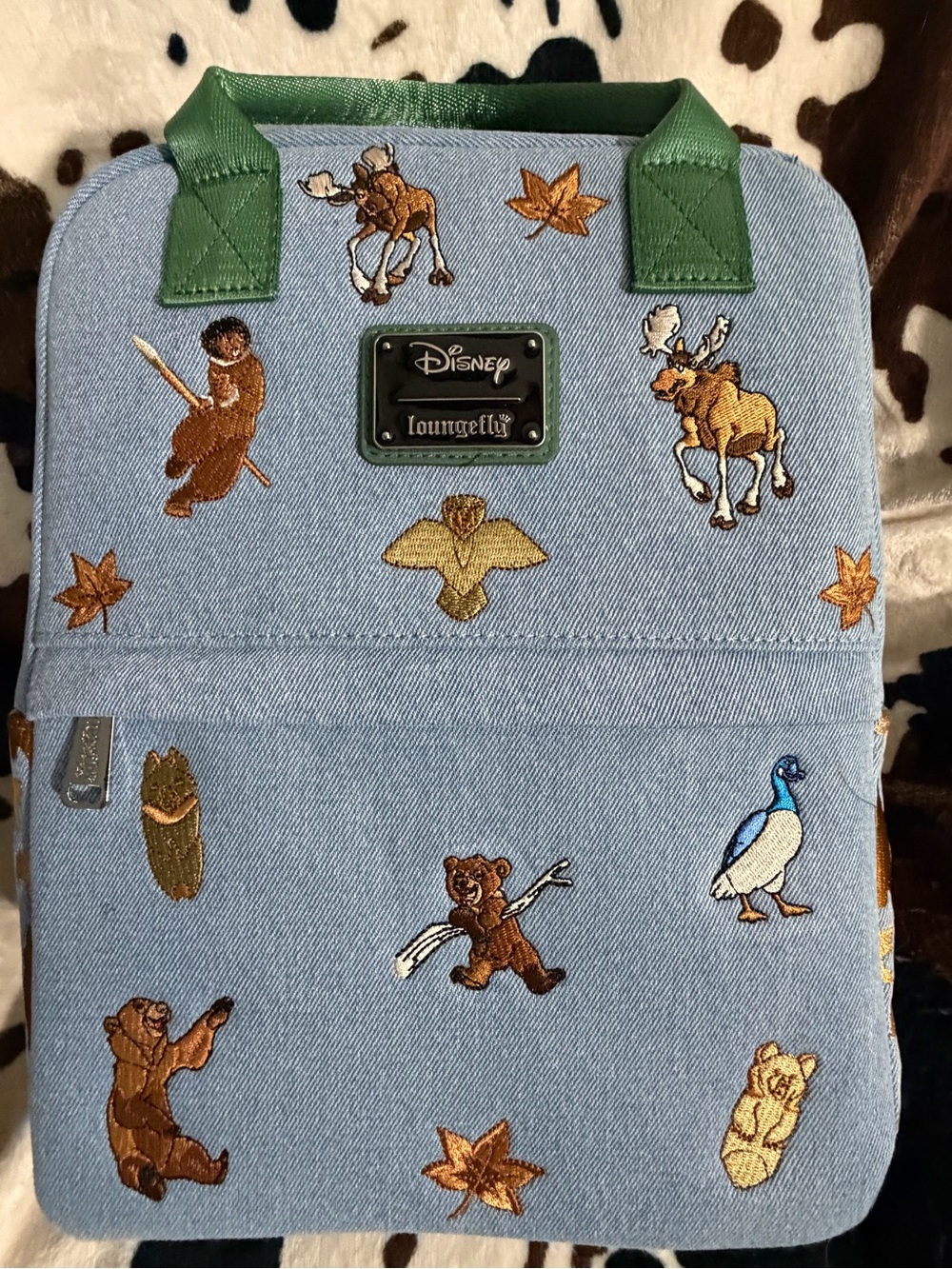 Loungefly Light Blue Denim Backpack with Green Trim and Gold Embroidery